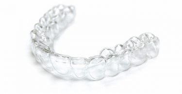 how to clean my invisalign retainer